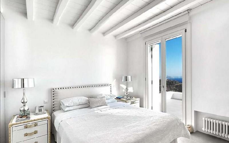 Villa_Nadine_12.jpg Houlakia Mykonos 4th Bedroom, bed, pillows, phone, lamp, night table