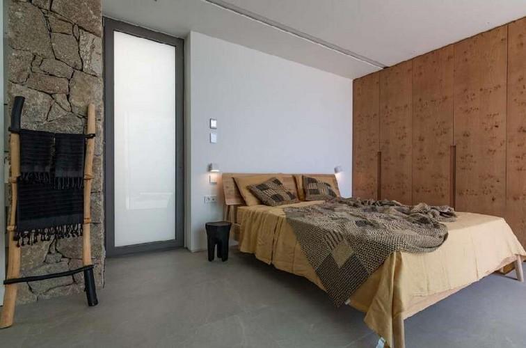 Villa_Nerina_15.jpg Tourlos Mykonos 2nd Bedroom, bed, lamp, door