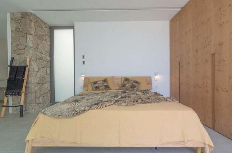 Villa_Nerina_16.jpg Tourlos Mykonos 1st Bedroom, bed, pillows, lamp, towels