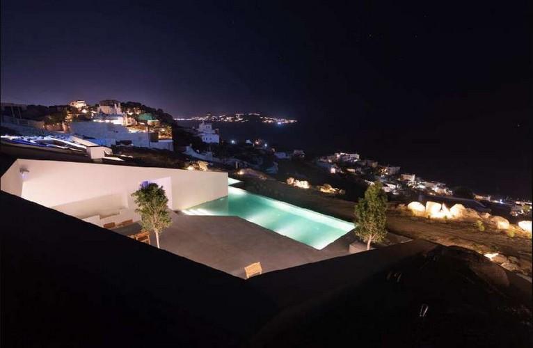 Villa_Nerina_30.jpg Tourlos Mykonos Outdoor, pool, tree, bed, pillows, sea