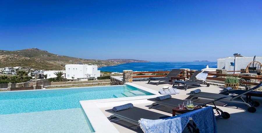 Villa_Sofy_04.jpg Kalafatis Mykonos Outdoor, hat, climbers, towels, pool, villa, sea, sky, hill