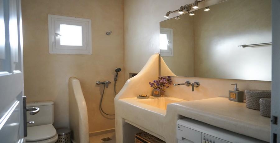 Villa_Sofy_25.jpg Kalafatis Mykonos 3rd Bathroom, washstand, toilet, shower, mirror, lamp, windows, soap