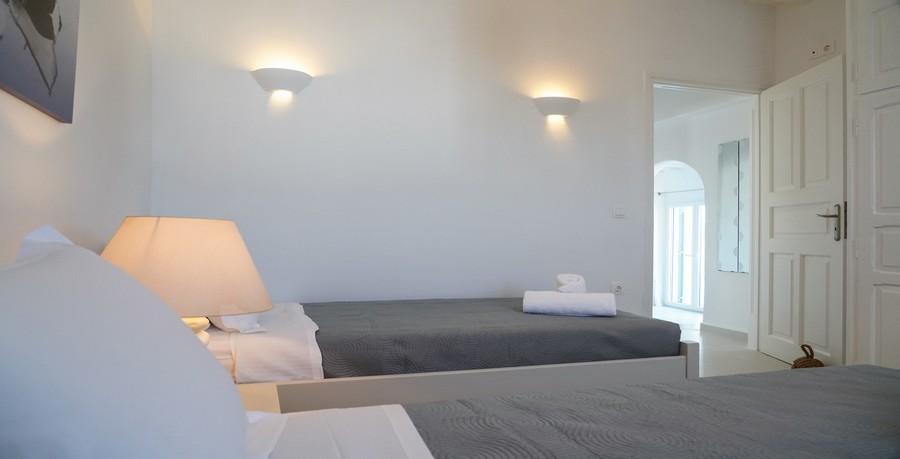 Villa_Sofy_28.jpg Kalafatis Mykonos 2nd Bedroom, bed, pillows, lamp, towels