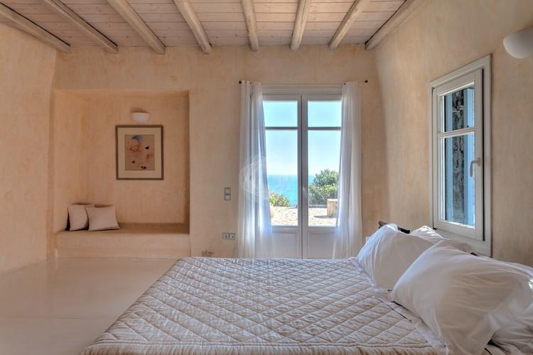Villa_Stavros_13.jpg Lia Mykonos 1st Bedroom, bed, pillows, windows, paint