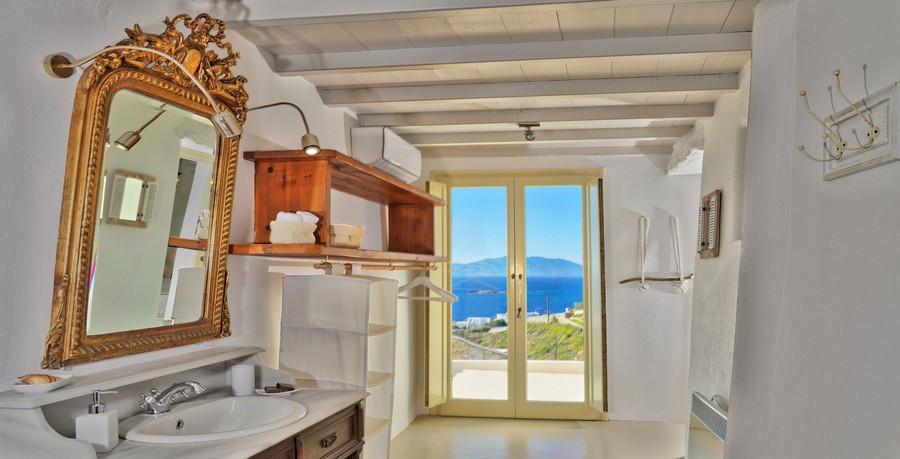 Villa_Tessa_21.jpg Agios Ioannis Mykonos 1st Bathroom, mirror, washstand, cabinet, air condition, lamp