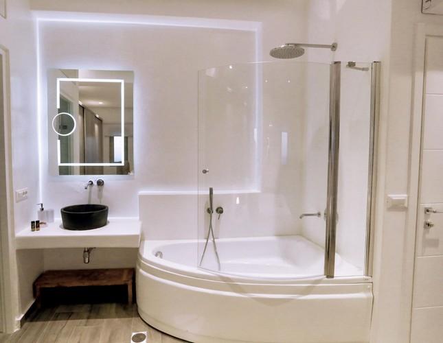 Villa_Yanni_04.jpg Fanari Mykonos 2nd Bathroom, shower, washstand, door, mirror