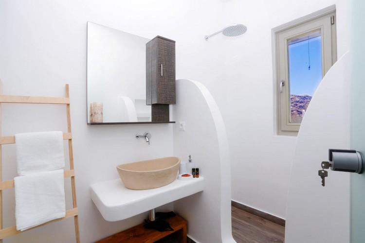 Villa_Yanni_21.jpg Fanari Mykonos 1st Bathroom, door, key, shower, mirror, washstand, towels