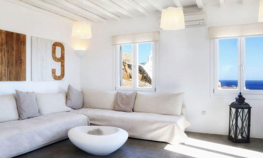Villa-Agda_24.jpg Agios Ioannis Mykonos, living room, windows, AC, paintings, pillows