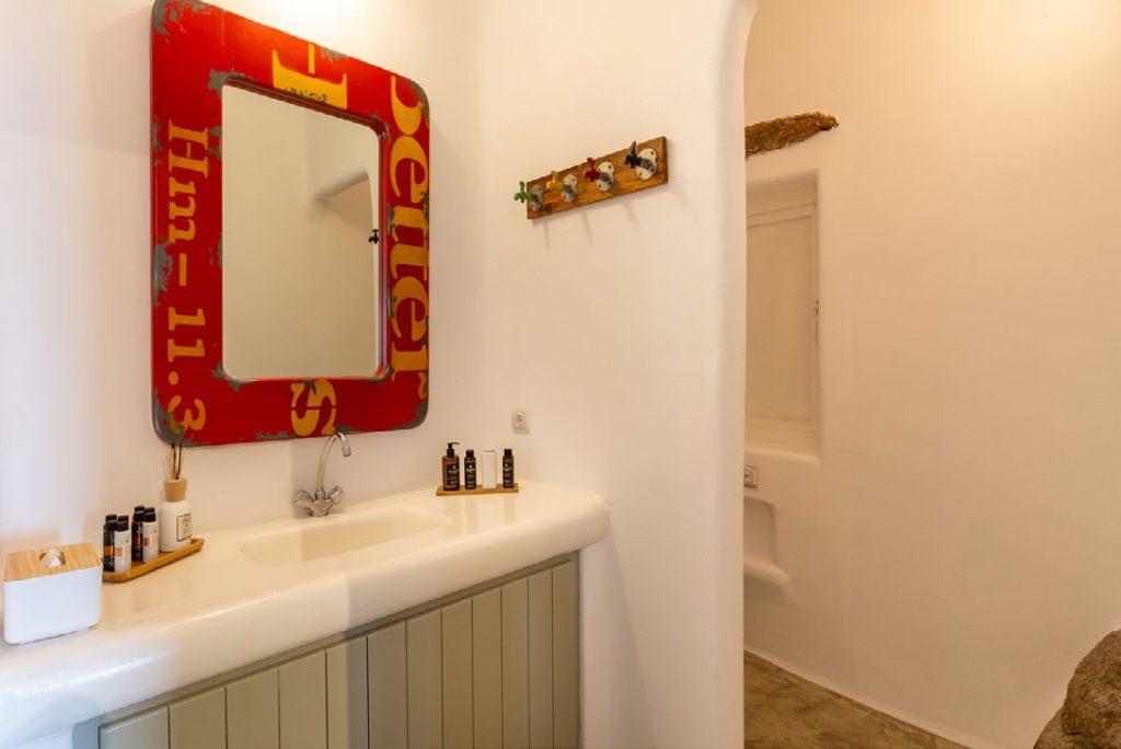 Villa-Camelia_34.jpg Agrari Mykonos, 2nd bathroom, mirror, washstand, drawers, soap