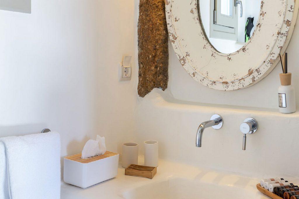 Villa-Camelia_36.jpg Agrari Mykonos, 1st bathroom, washstand, mirror, towel, soap