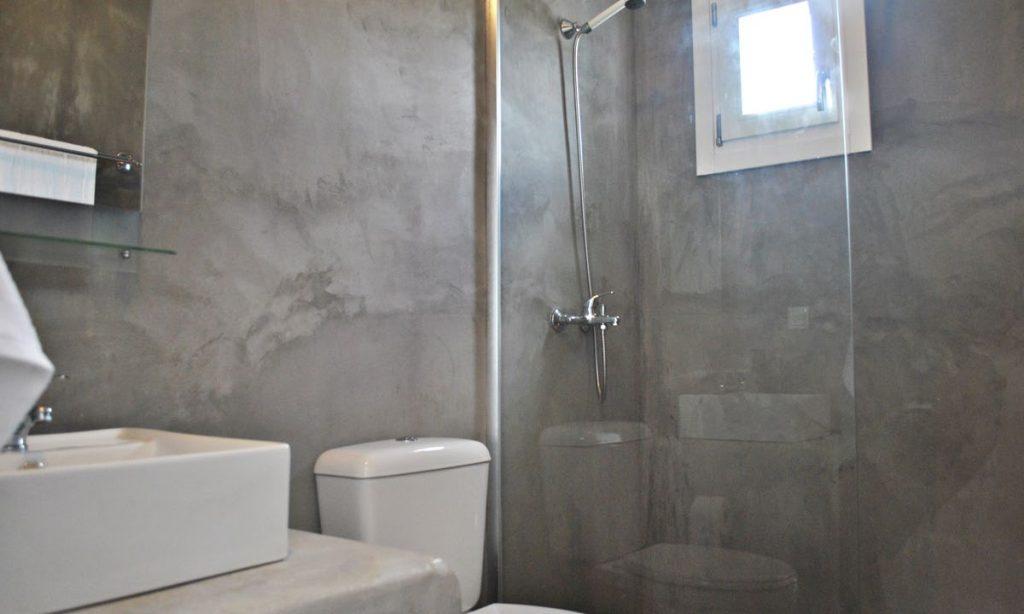 modern minimal style bathroom with grey walls