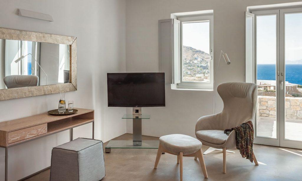 Villa-Paige-_29.jpg Elia Mykonos, living room, flat screen TV, chair, desk, mirror, window