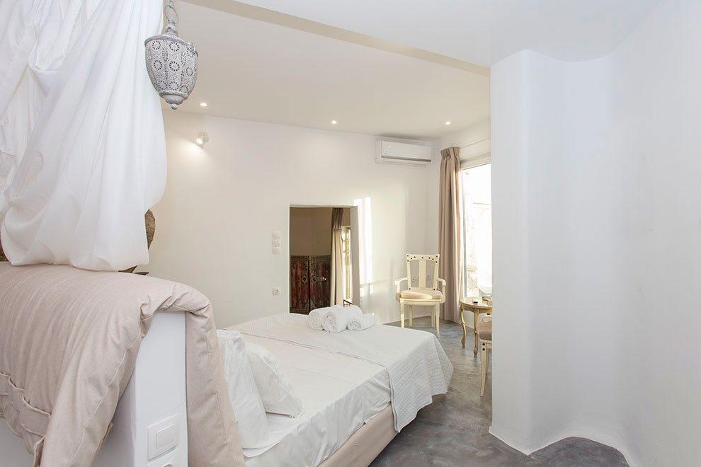 Villa-Ramsey-_25.jpg Halara Mykonos, 7th bedroom, bed, towels, robes, AC, chair