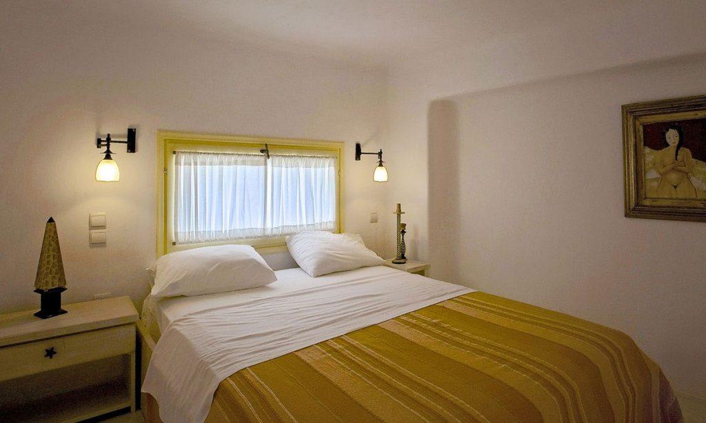 Villa-Ramsey-_34.jpg Halara Mykonos, 9th bedroom, king size bed, pillows, nightstands, painting, curtains, lamps
