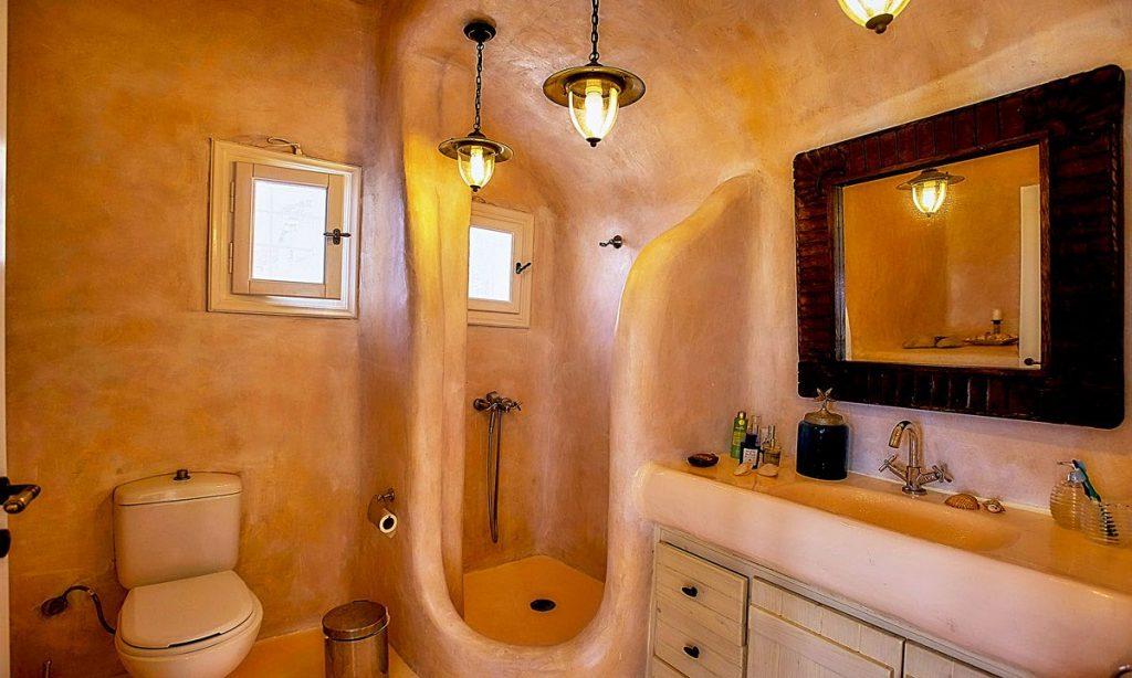 Villa-Ramsey-_35.jpg Halara Mykonos, 1st bathroom, shower, toilet, mirror, drawers, washstand, soap