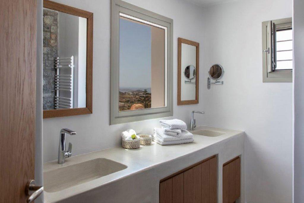 Villa-Sabina_50.jpg Kounoupas Mykonos, 2nd bathroom, washstands, mirrors, towels, soap, drawers