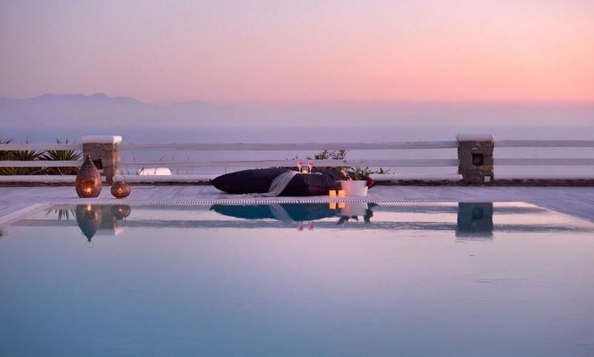 Villa_Patricia_04.jpg Super Paradise Mykonos Outdoor, bed, candle, bottle, sea, sky, horizon