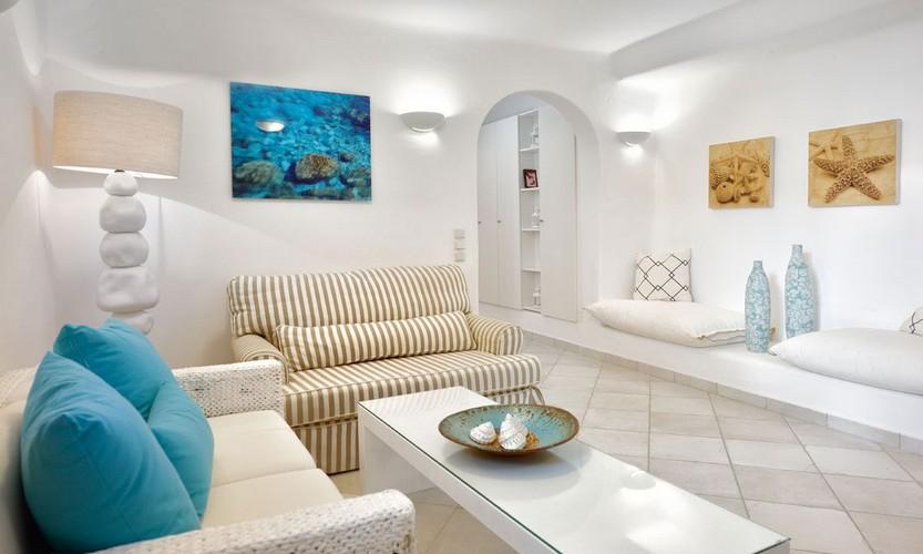 Villa_Patricia_32.jpg Super Paradise Mykonos Living area, plate, paint, bench, vase, bed, pillows, cabinet, shelf