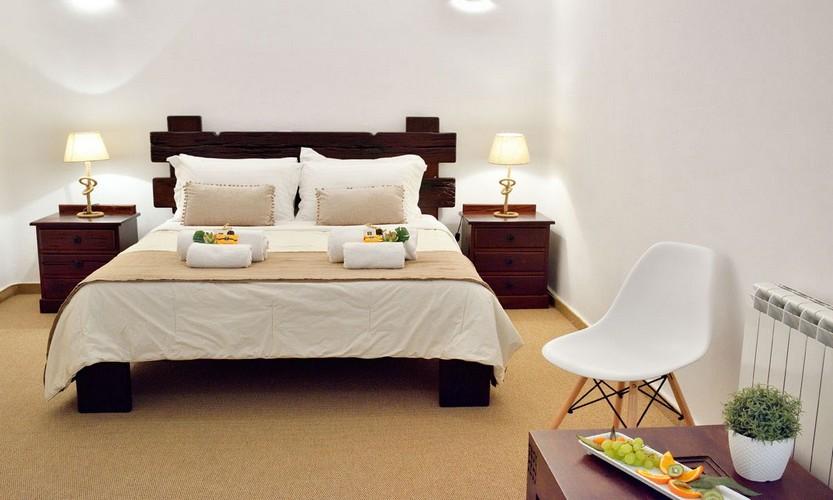 Villa_Patricia_39.jpg Super Paradise Mykonos 1st Bedroom, bed, pillows, towels, chair, lamp