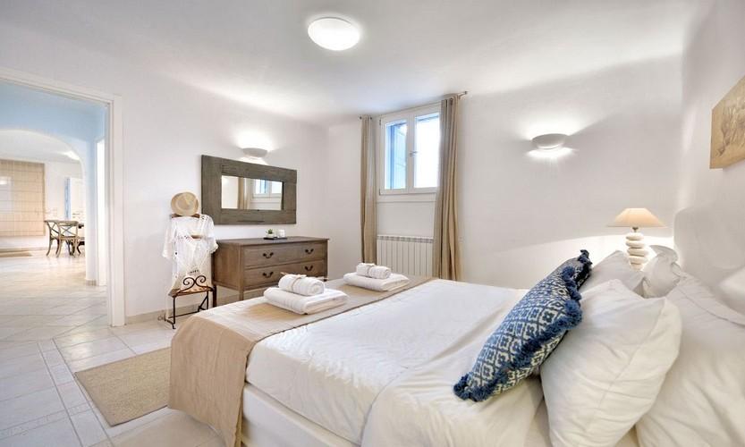 Villa_Patricia_40.jpg Super Paradise Mykonos 4th Bedroom, hat, bed, pillows, lamp, night table, curtains