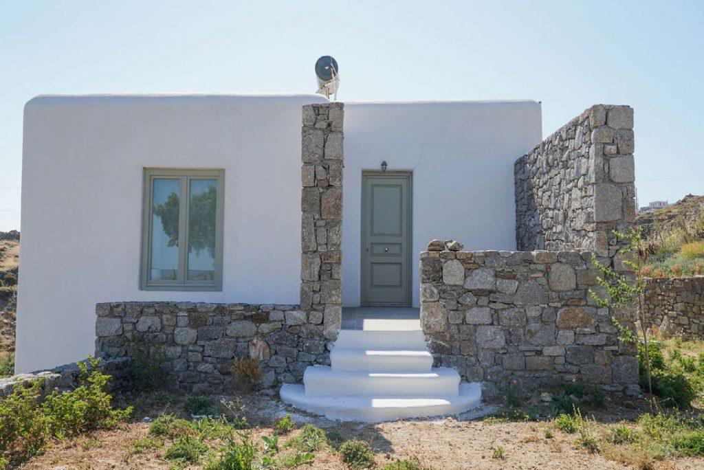 Villa Umabel, Agios Stefanos, Mykonos, Stone wall,, Table, Door, Stirs, Planrs, Sly
