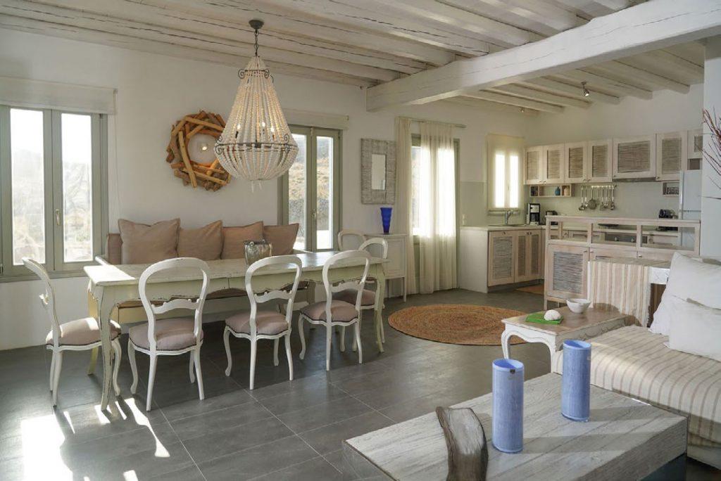 Villa Umabel, Agios Stefanos, Mykonos, Windows, Chairs, table, Sofa, Pillows, Lamp, Dinning room, Living room, Flatscreen TV
