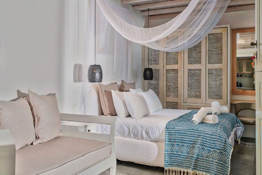 Villa Umabel, Agios Stefanos, Mykonos, Closet, Bed, Pillows, Sofa, Towels, Door, Lamp