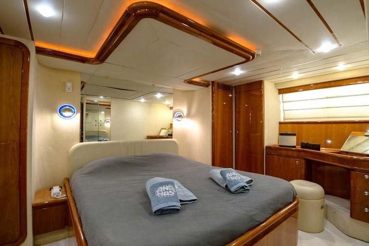 Yacht_Ananas_05.jpg Mykonos 2nd Bedroom, bed, towels, chair, table, mirror, phone