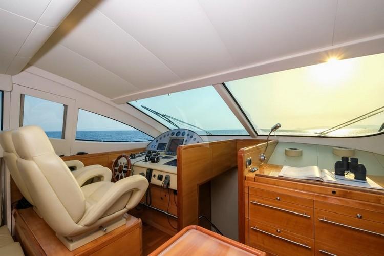 Yacht_Noe_08.jpg Mykonos Interior, chairs, wheel, book, sea, sky, horizon, cabinet