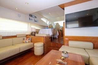 Yacht_Noe_18.jpg Mykonos Living area, flat screen tv, bed, pillows, table