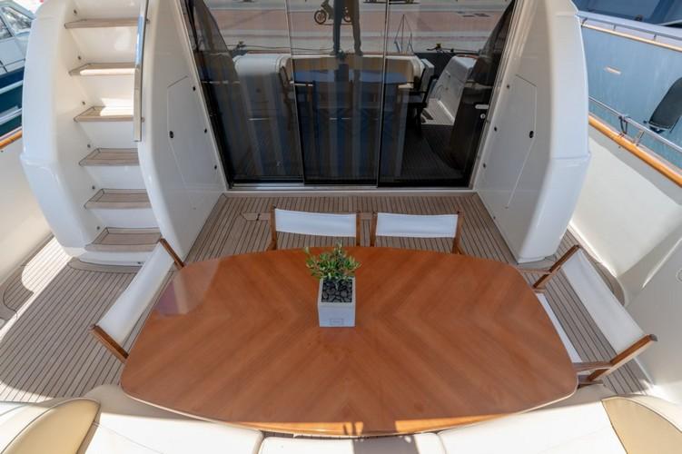 Yacht_VenusSecret_03.jpg Mykonos Exterior, deck, boat, table, chairs, stairs