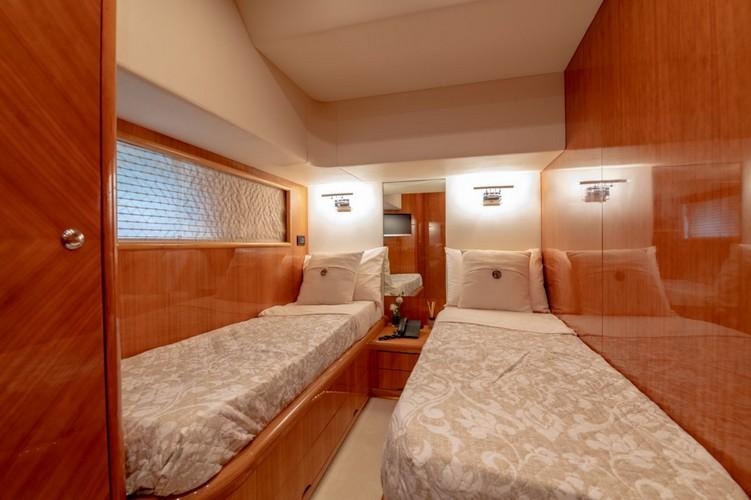 Yacht_VenusSecret_19.jpg Mykonos 2nd Bedroom, bed, pillows, lamp, night table