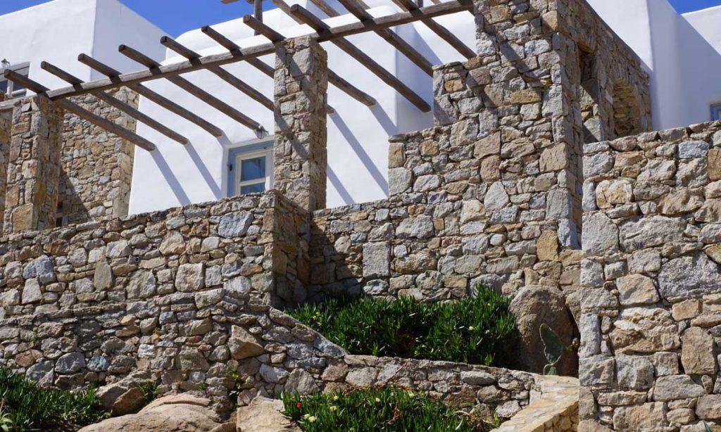 Villa Naenia Psarrou Mykonos, outdoor, villa exterior, stone wall