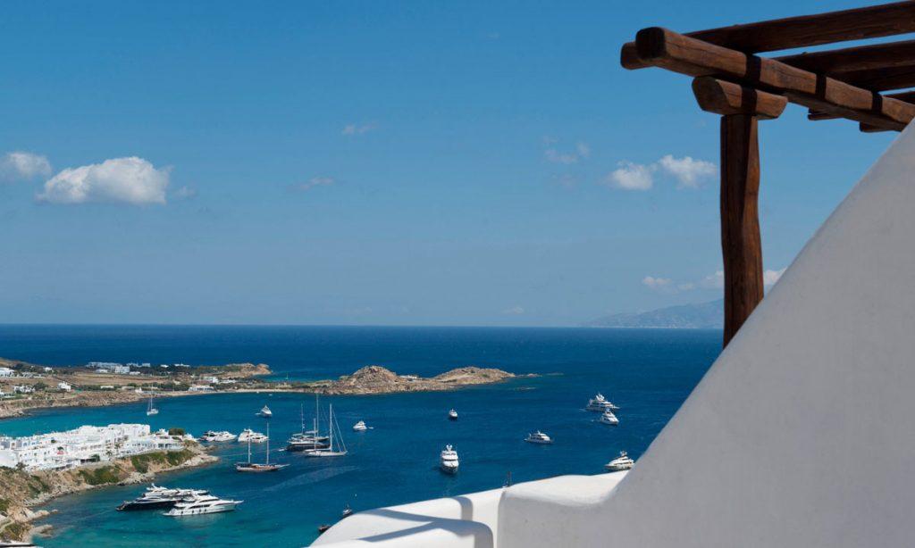 Villa Naenia Psarrou Mykonos, terrace view, sea, sky, clouds, boats, yachts, island
