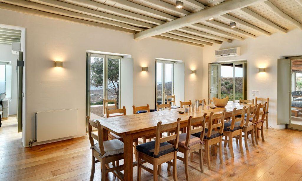 Villa Raisa Super Paradise Mykonos, dining room, dining table, chairs, bowl, AC, doors