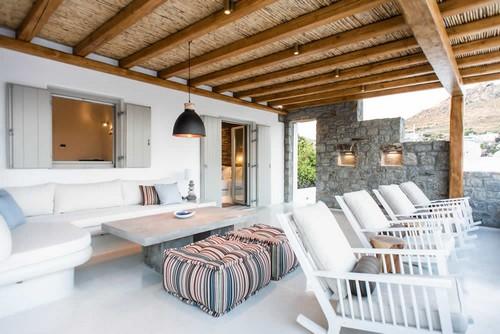 Villa_Levi_01.jpg Chora Mykonos Outdoor Living area, bed, pillows, window, lamp