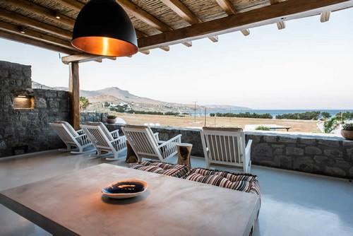 Villa_Levi_02.jpg Chora Mykonos Outdoor Living area, table, chairs, lamp, sea, sky