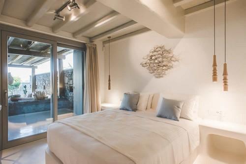 Villa_Levi_08.jpg Chora Mykonos 1st Bedroom, bed, pillows, lamp, curtains