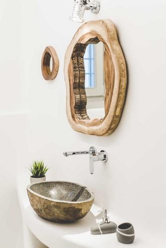 Villa_Levi_14.jpg Chora Mykonos 1st Bathroom, mirror, washstand, soap, plant, lamp