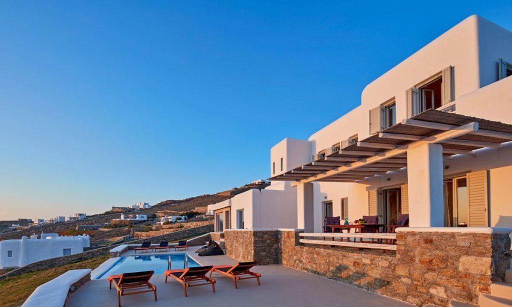 Villa Orion Retreat, Houlakia, Mykonos, villa exterior, pool, climbers, sky