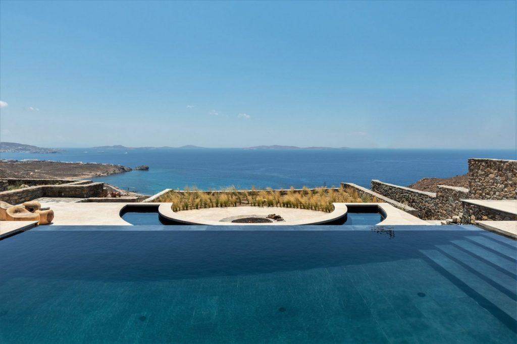 enormous pool overlooking sea and island panorama