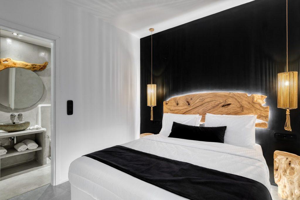 nice decorated bedroom with black illuminated wall