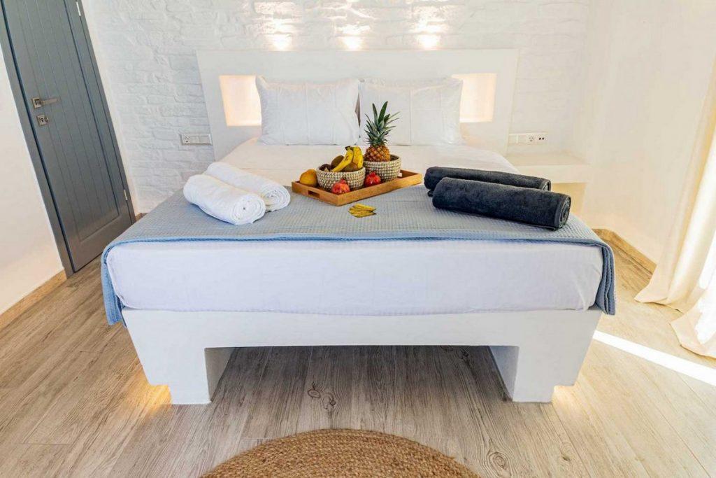 bedroom with wooden floor and comfort bed