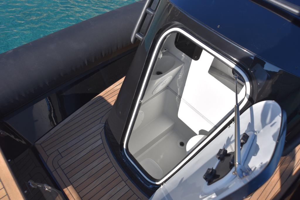 yacht bathroom with sink and toilet