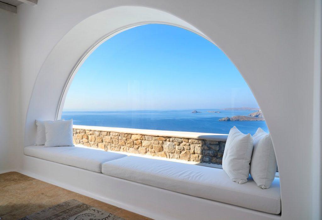 perfect place to sit on sofa and enjoy mesmerizing Mykonos panorama