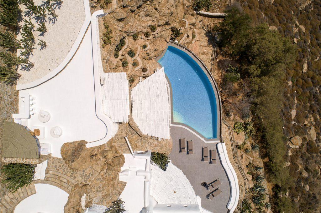 bird's eye view of villa pool area and its capabillities