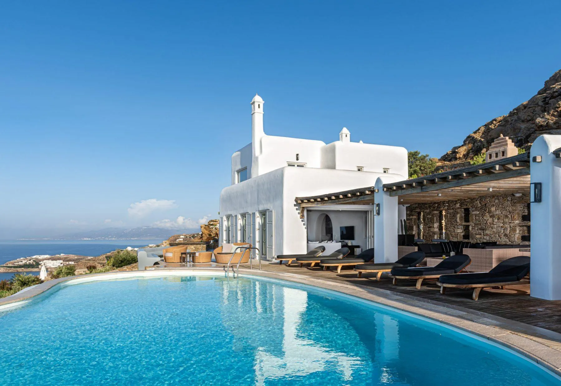 View of the pool and a villa in Mykonos