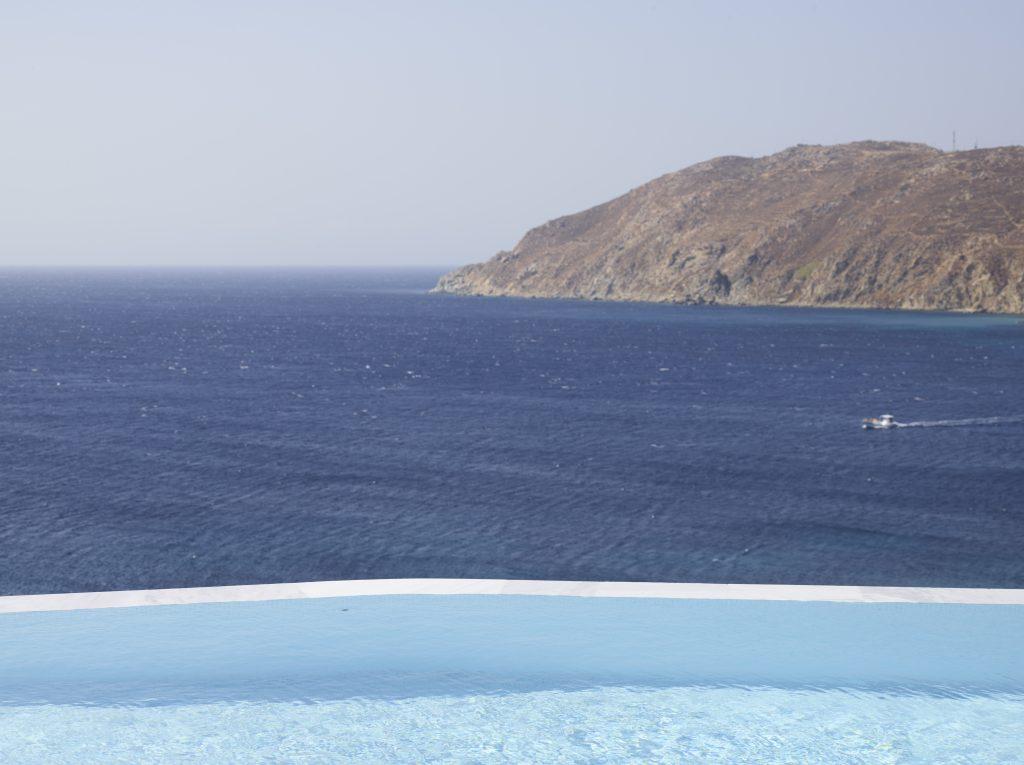 take a dip and enjoy island cliff panorama
