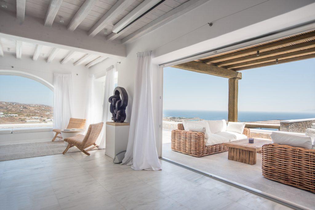 spacious balcony overlooking the endless blue sea is an ideal place to enjoy a quiet summer day