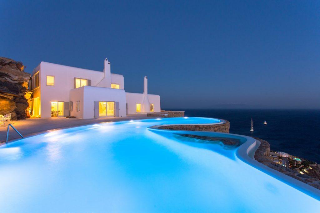 night view of a dimly lit luxury villa